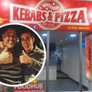 Rob McElhenney with owner Mo at Kebabs & Pizza, King Street, Wrexham