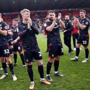 Wrexham midfielder Andy Cannon celebrates