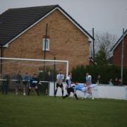 BIG CLASH: Action from Llay's defeat to Flint Mountain. Picture by BRIAN PRYDDEN