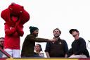 Wrexham co-owner Ryan Reynolds, executive director Humphrey Ker and co-owner Rob McElhenney celebrate on an open-top bus during a victory parade in Wrexham, Wales. during a victory parade in Wrexham, Wales. Picture date: Tuesday May 2, 2023. PA Photo.