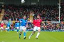 Wrexham striker Ollie Palmer in action against Stockport. Picture by GEMMA THOMAS