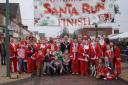 Runners at the Buckley Santa Dash. Picture: Julie Simpson