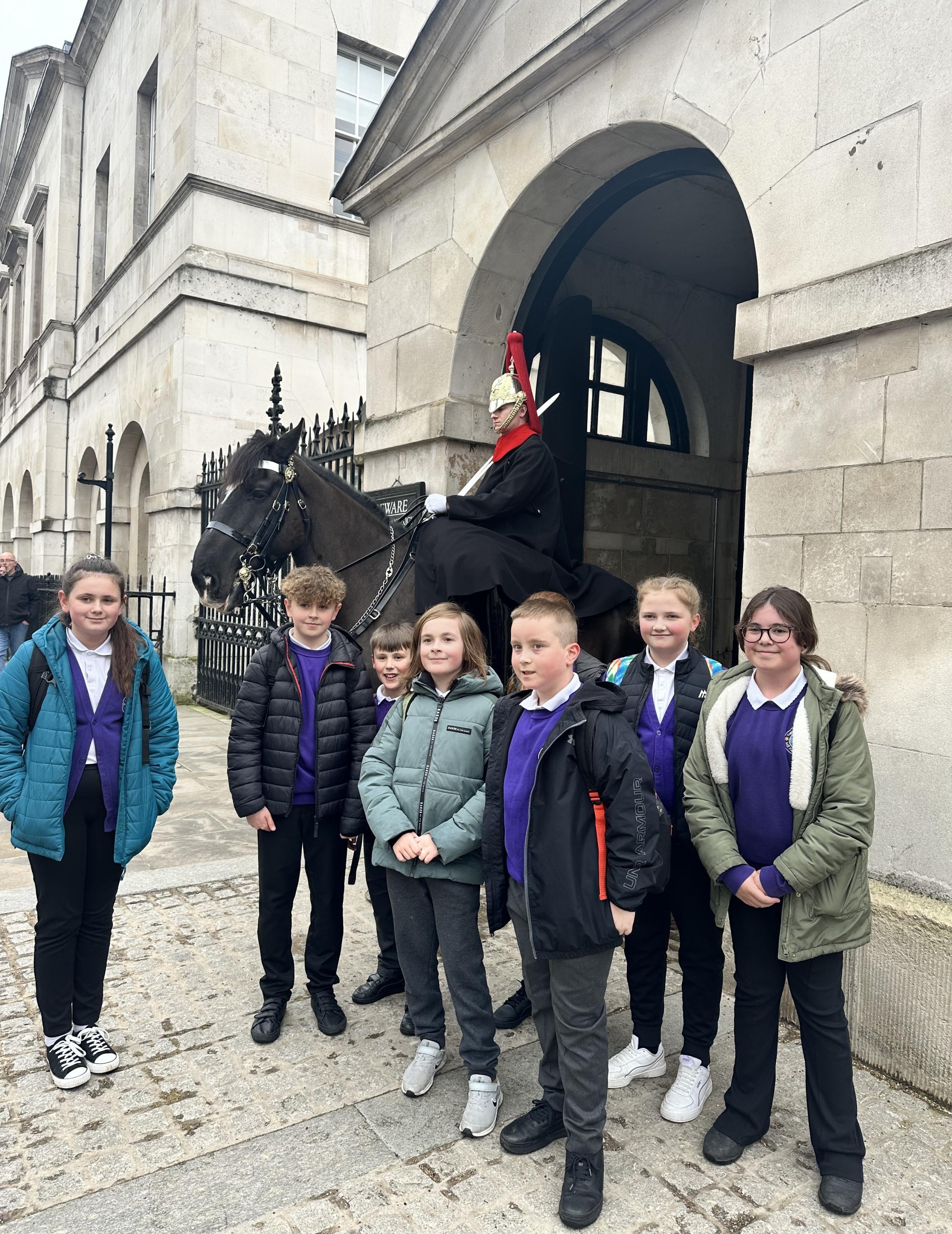 The pupils pictured with a Horse Guard, Westminster Walk.