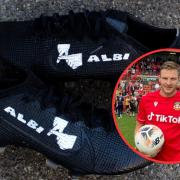 Paul Mullin (inset) and the latest boots designed for him and son Albi by Zebra Customs.