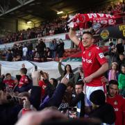 Paul Mullin during Wrexham's promotion celebrations at the Racecourse.