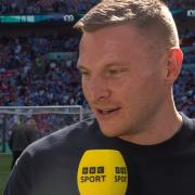Paul Mullin is interviewed during the FA Cup final.