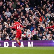 Liverpool's Trent Alexander-Arnold celebrates scoring their side's first goal of the game during the Premier League match at Craven Cottage, London. Picture: Zac Goodwin/PA Wire.