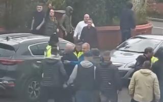 Videos online showed fans taking part in violent disorder on residential roads near Boundary Park (Picture: Spotted Oldham)