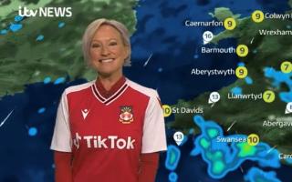 Ruth Dodsworth presenting the weather forecast in her Wrexham shirt!
