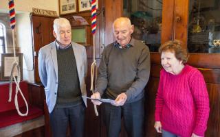 In the ringing room at St Matthew's Church in Buckley are tower captain Geoff Parting (centre) with ringers Ruth Ralphs and Simon Griffiths.