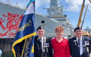 Jeff Hughes (left) Sarah Atherton MP and Kevin Hackett (right) in front of HMS Dragon