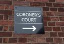 A coroner's court sign.
