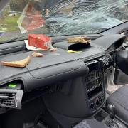 The vehicle's windscreen was smashed and coke was poured over the electrics.