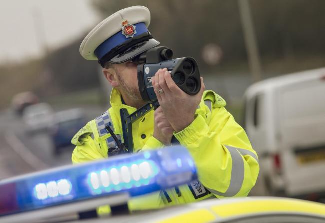 File image of PCSO with a speed camera.