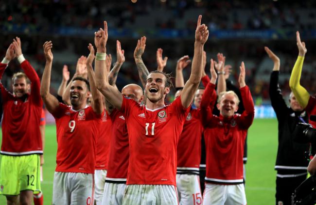 Wales' Gareth Bale celebrates with team-mates after the UEFA Euro 2016, quarter final match at the Stade Pierre Mauroy, Lille.