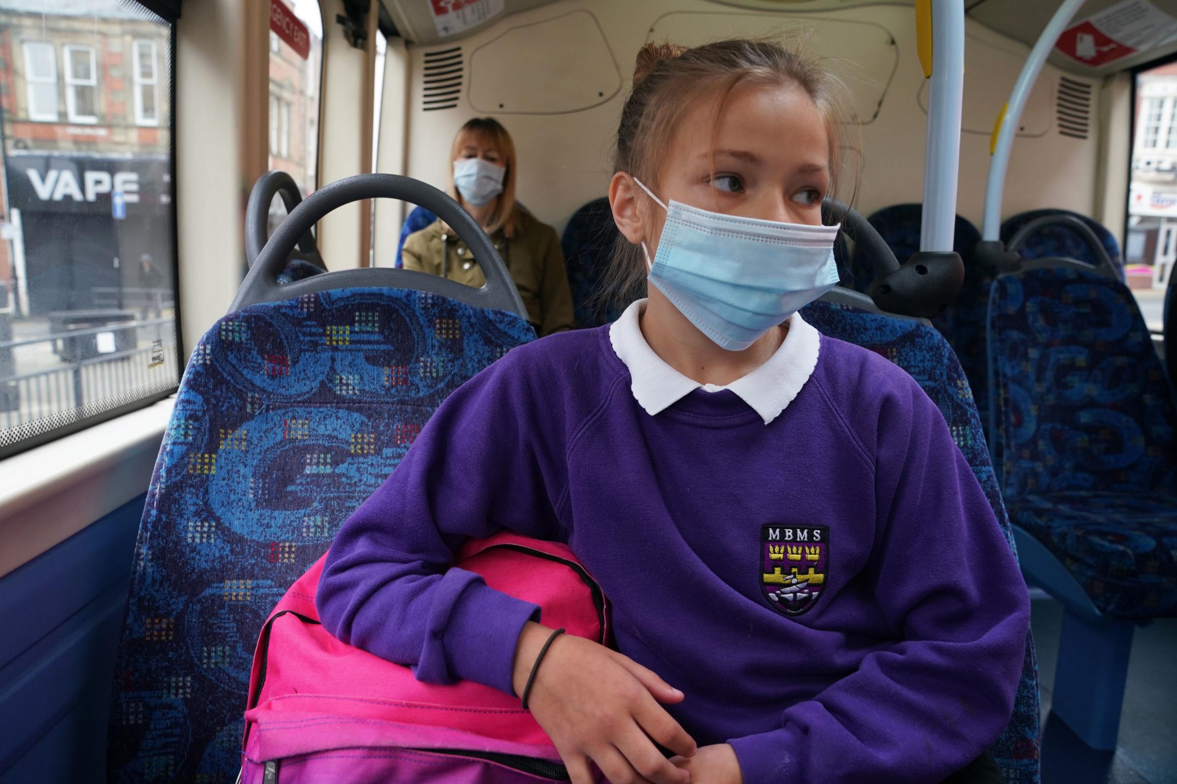 School pupil wearing a face mask. Photo credit Owen Humphreys/PA Wire.