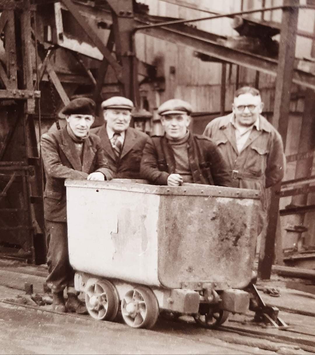 Photo taken in the late 1940s at Pen-y-Bryn shaft top Halkyn. Pictured are Ernie Marshall, Albert Richardson (Rob’s grandad), Evan Jones and Jim Blythin. Photo courtesy of Rob Richardson