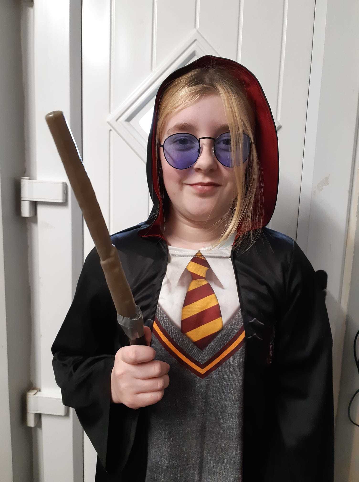 Abileigh Gregson as wizard Harry Potter.