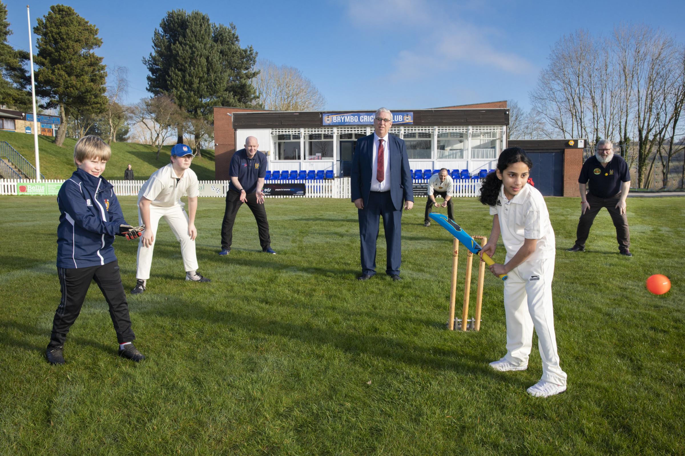PCC Your Community your choice awards; Pictured at Brymbo cricket club; young Brymbo cricketer Tanvee Pallath plays straight as the field closes in, from left, front Tomos Rhys and Morgan Jones, rear, Brymbo vice-chairman Dafydd Rhys, North Wales Police