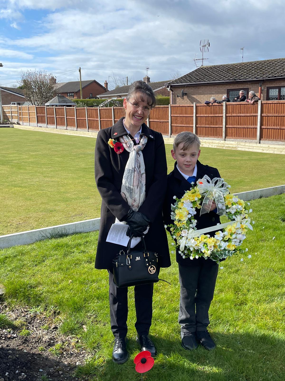 Cheryl Barry and Dewi Elwell representing Ysgol Sychdyn laid a wreath. 