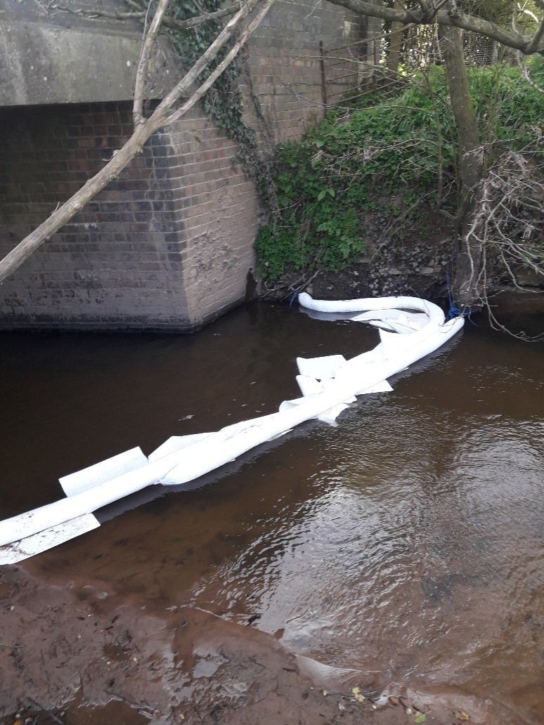 The booms placed downstream. (Source - Natural Resources Wales)