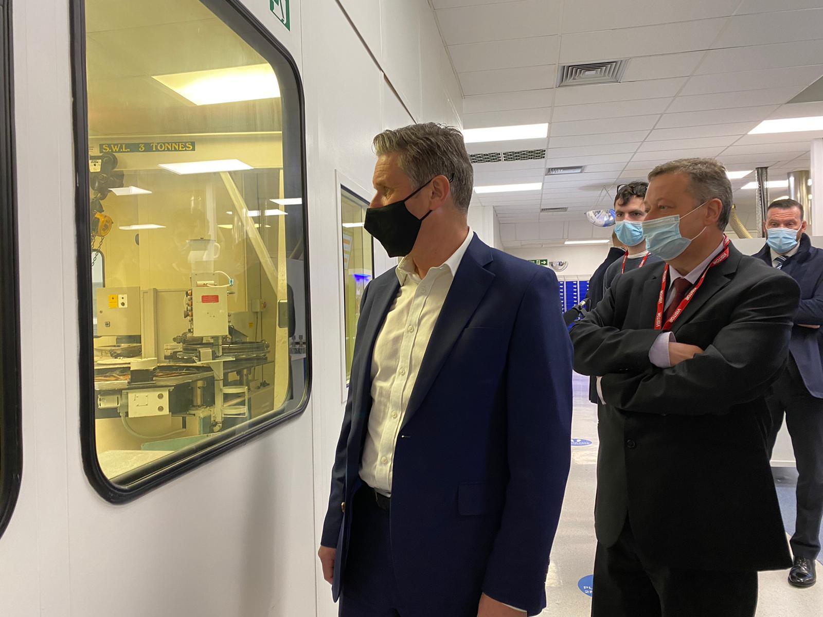 Taking a closer look during a visit to the Qioptiq in Bodelwyddan. Pictures: Welsh Labour