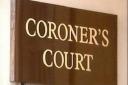 A coroner's court sign.