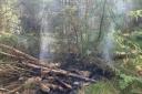 The smouldering fire at Coed Moel Famau (image: Denbighshire County Council)