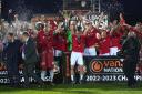 Wrexham celebrate their National League title win.