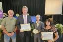 Cllr Nigel Williams accepts the award on behalf of Wrexham Council.