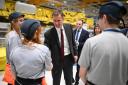Chancellor of the Exchequer Jeremy Hunt meets apprentices, on the Airbus A350 wing manufacturing production line during a visit to the Airbus North Factory.