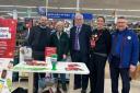 Mark Tami MP and Jack Sargeant MS with staff at Tesco Broughton.