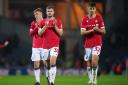 Wrexham's James Jones and Max Cleworth applaud fans after the FA Cup fourth round match at Ewood Park, Blackburn. Picure: PA