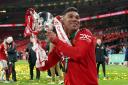 Manchester United's Casemiro lifts the trophy after the Carabao Cup Final match at Wembley Stadium, London. Picture date: Sunday February 26, 2023..
