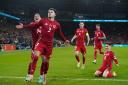 Neco Williams (second left) celebrates after scoring Wales’ second goal against Finland