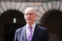 John Swinney has appointed his cabinet and ministerial team (Andrew Milligan/PA)