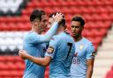 Aston Villa's John McGinn (centre) celebrates scoring his side's fourth goal of the game with team mate Jack Grealish during the pre-season friendly match at The Valley, London..