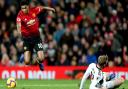 Manchester United's Marcus Rashford (left) jumps over a challenge from Fulham's Tim Ream (right) during the Premier League match at Old Trafford, Manchester. PRESS ASSOCIATION Photo. Picture date: Saturday December 8, 2018. See PA story SOCCER