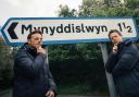 Ant and Dec posed on Instagram with the Welsh Mynyddislwyn sign in the background. Picture: Instagram / antanddec