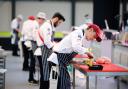 Butchers showing their skills at a previous competition.