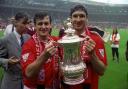 MANCHESTER UNITED GOALSCORERS MARK HUGHES [L] AND ERIC CANTONA SHOW OFF THE FA CUP AT WEMBLEY, AFTER THEIR TEAM BEAT CHELSEA 4-0  IN 1994..