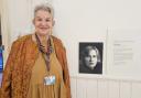 Yadzia Williams, Senior Lecturer in Art and Design at Wrexham University, with a photo of the late Pat Cooke.
