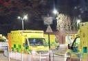 Picture shows ambulances queuing outside hospital