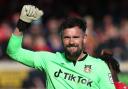 Wrexham goalkeeper Ben Foster celebrates after the Vanarama National League match at the Racecourse Ground, Wrexham. Picture date: Monday April 10, 2023.