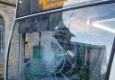 The damaged bus following the incident.
