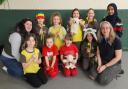 Bishop's Own Rainbows and Brownies, with Young Leader Carys Jones (Sunflower) on the left and Brownies Leader Alison Cassidy (Clover), on the right.