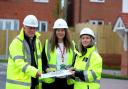 Eoin O’Donnell and Emma Jenrick, from Castle Green Partnerships, handing over the first affordable homes at Llys y Coed, Rhosrobin to Lauren Eaton-Jones, from North Wales Housing Association