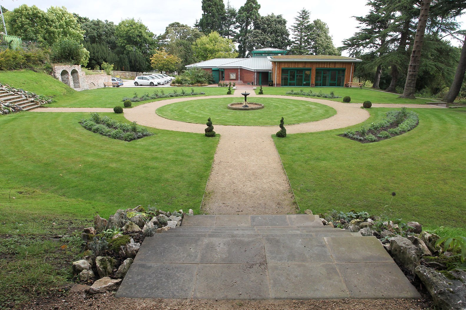 Visitor centre and gardens at the start of wooded walks at Wepre Park .