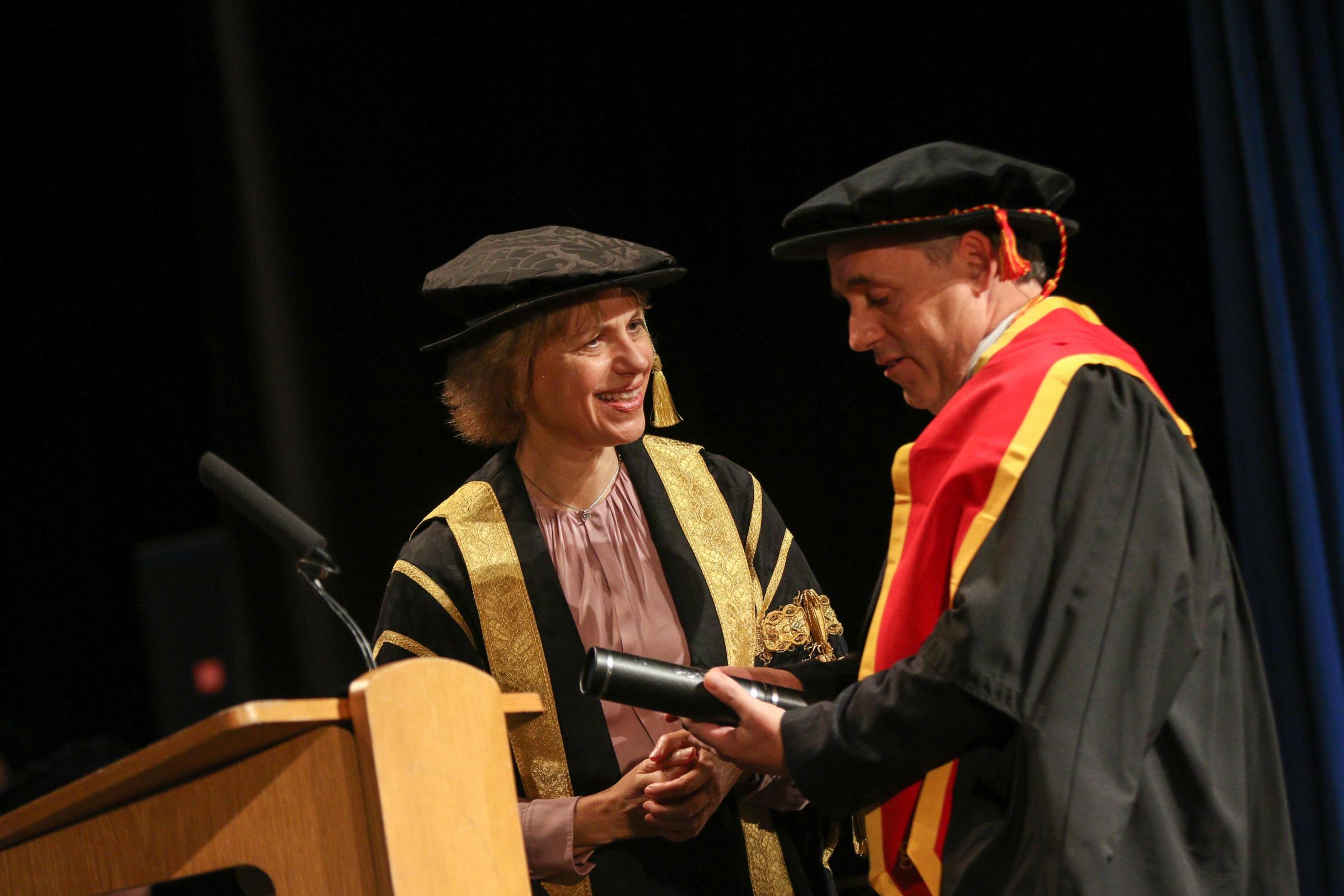 Glyndwr University graduation ceremony.Thursday 1st November 2018 2.30pm..cc011118B..Christopher Morris receives his honorary Fellow from Professor Maria Hinfelaar Vice Chancellor of Glyndwr University.