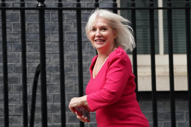Health minister Nadine Dorries arrives at Downing Street, London, as Prime Minister Boris Johnson reshuffles his Cabinet. (PA)